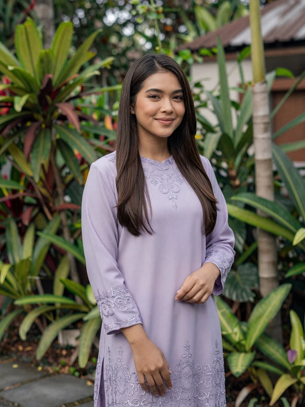 Bruneian woman in elegant baju kurung traditional dress representing educated Bruneian singles seeking meaningful relationships