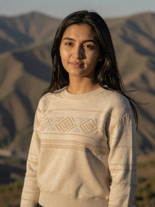 Kyrgyz woman in modern attire with traditional patterns representing educated Kyrgyz singles seeking meaningful relationships